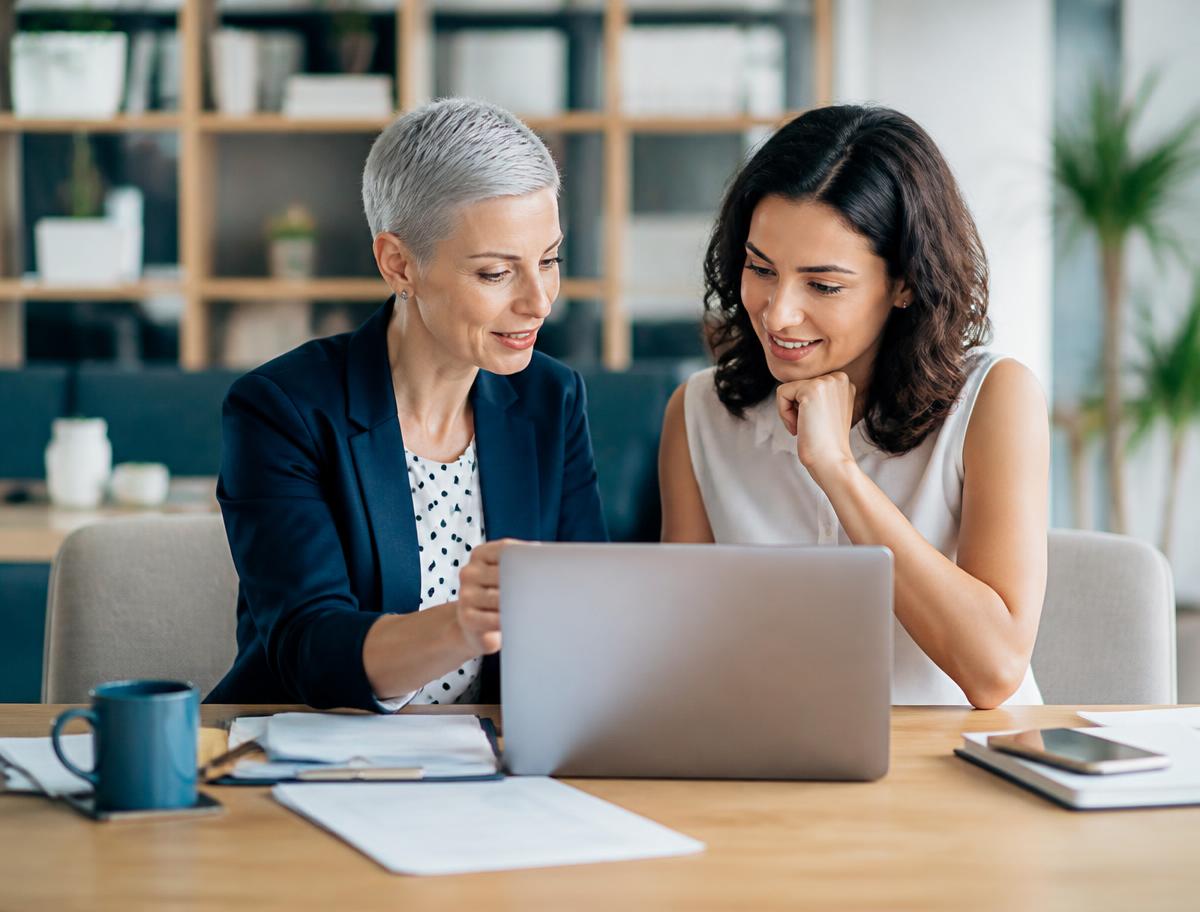 Mentor supporting a professional portfolio review
